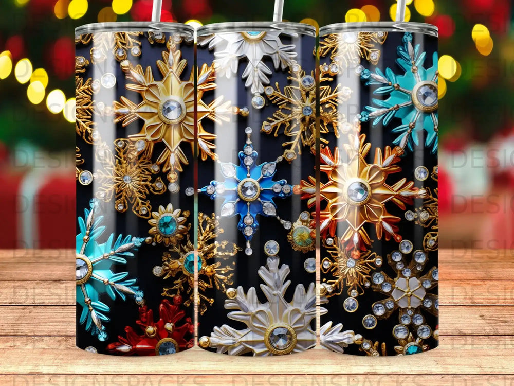 Gold, silver, blue, and red snowflake designs on a black tumbler.