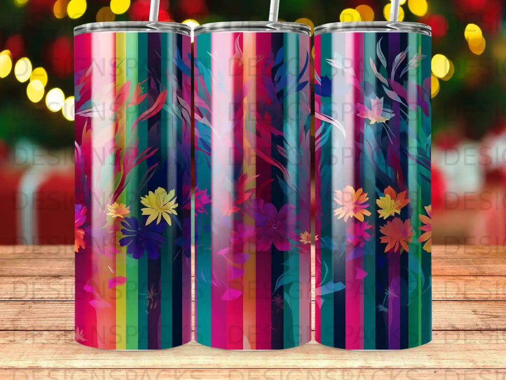Striped tumbler with floral accents and a colorful gradient design.