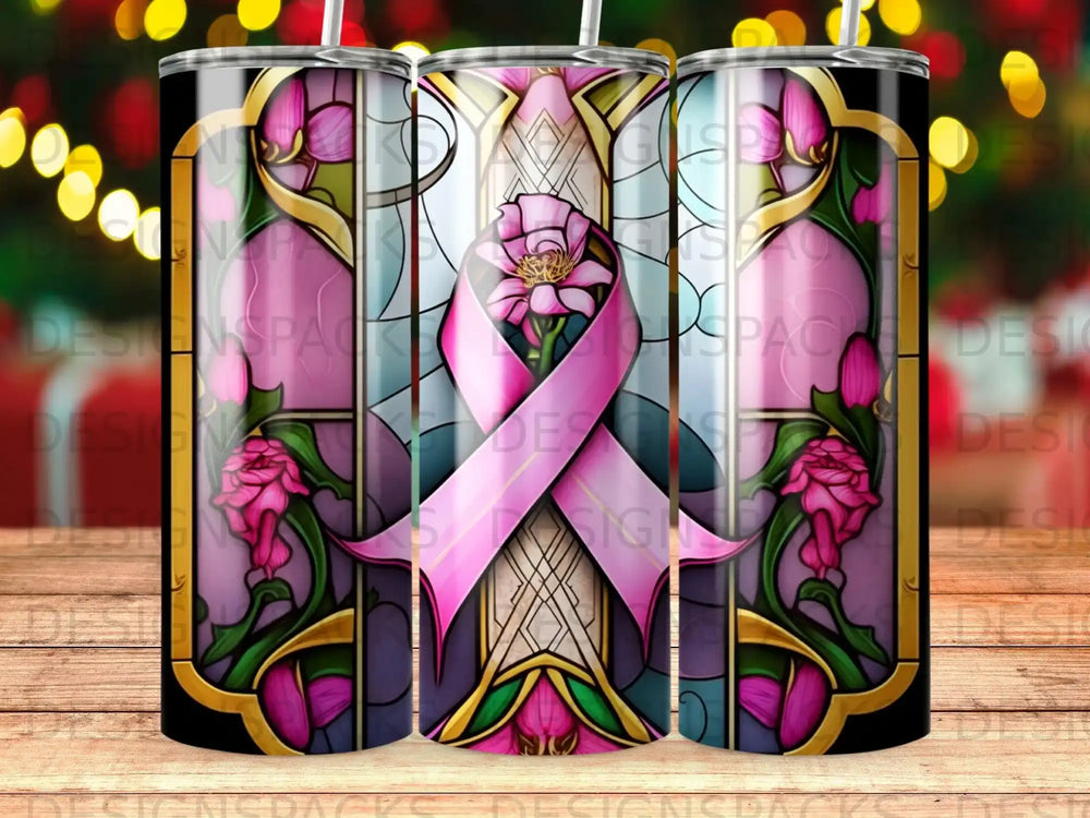 Stained glass design with pink ribbon and floral motifs on a tumbler.