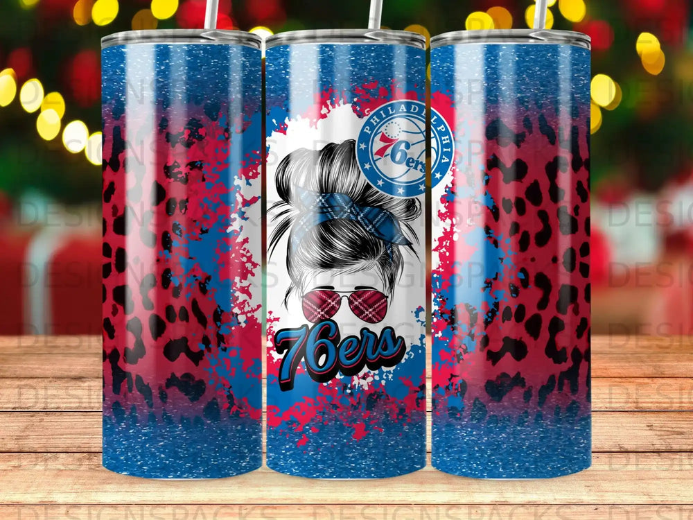 Philadelphia 76ers tumbler with red, white, and blue splatter design.
