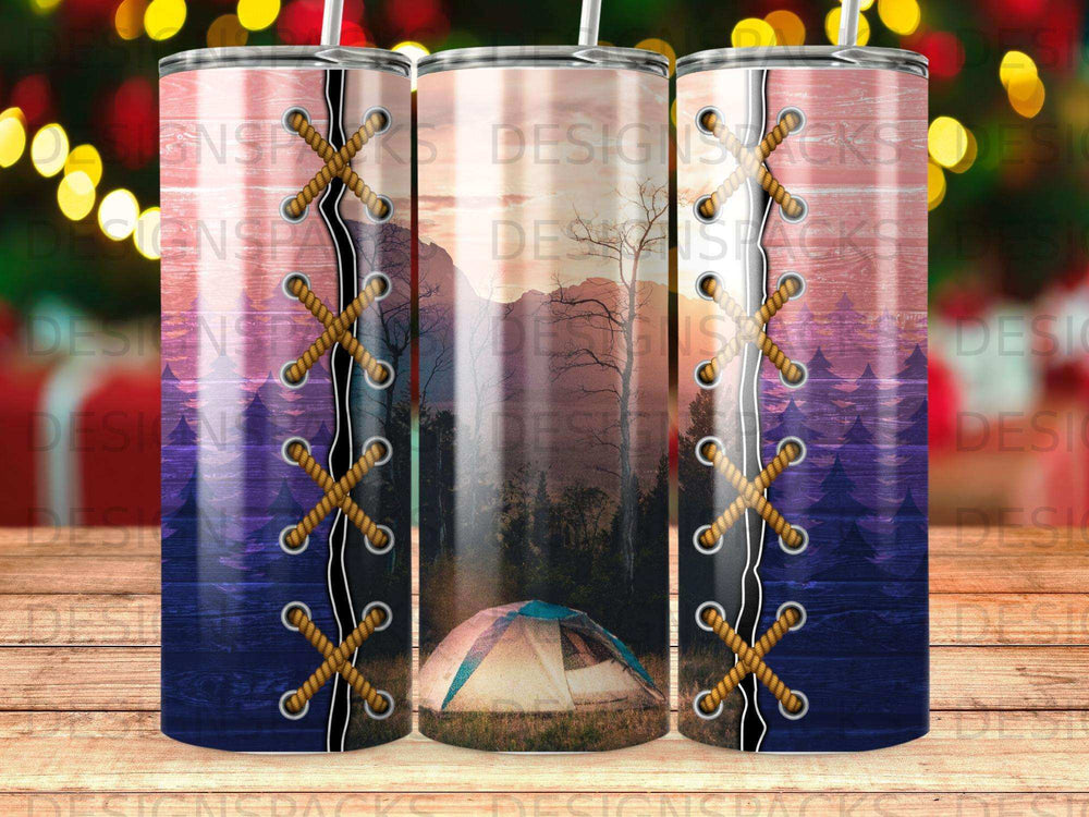 Tumbler with a nature scene featuring a tent and mountains, tied with rope.