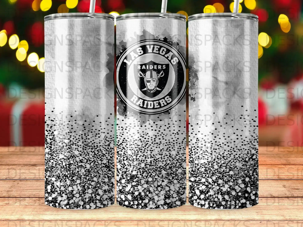 Las Vegas Raiders tumbler with glitter and speckle pattern.