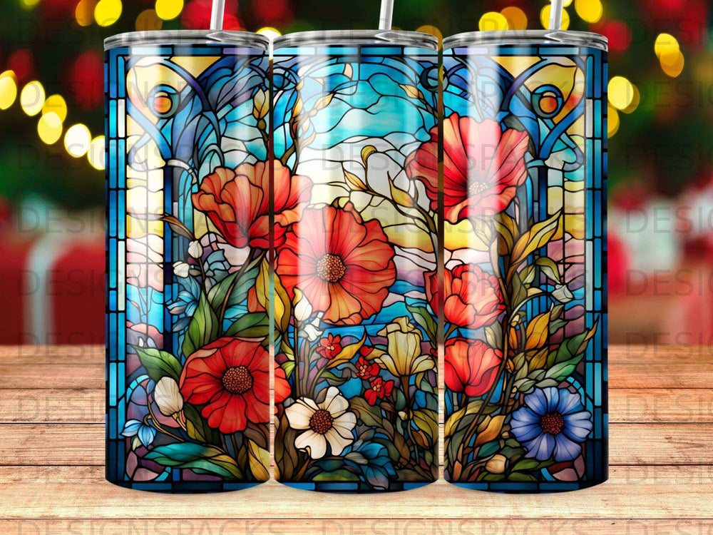 Stained glass tumbler with red and blue flowers.
