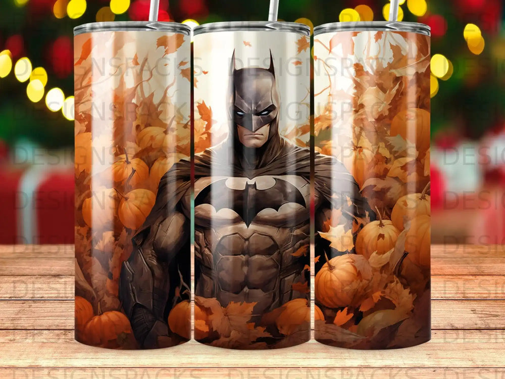 Batman surrounded by pumpkins and fall leaves.