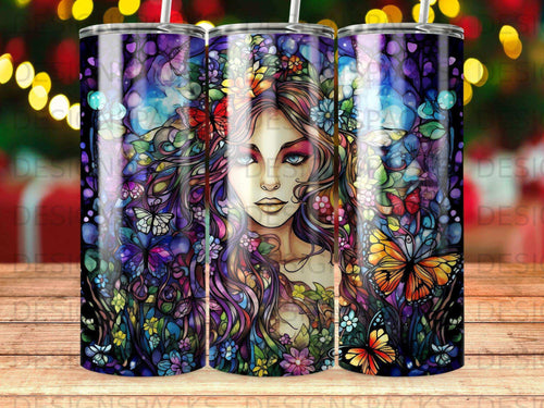 Woman's face with colorful hair adorned with flowers and butterflies.