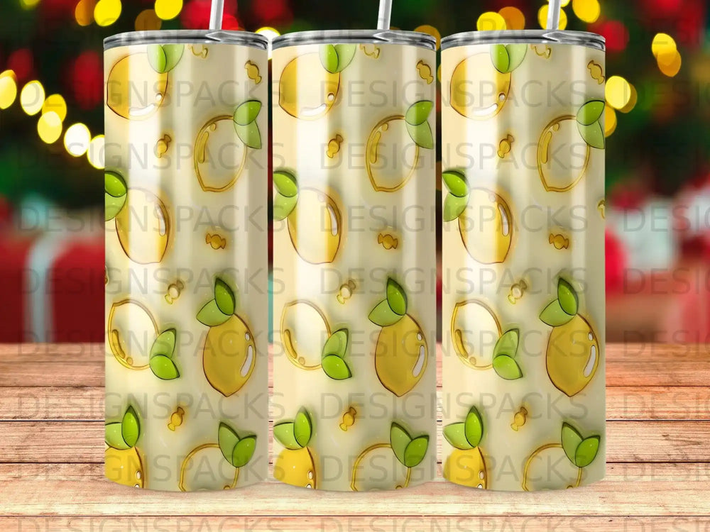 Tumbler with repeating pattern of yellow lemons and green leaves on a light background.