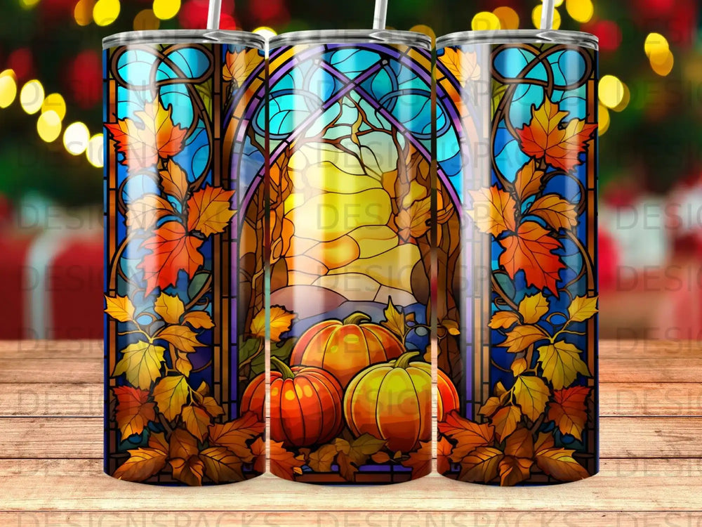 Stained glass tumbler design with pumpkins, autumn leaves, and forest scene.