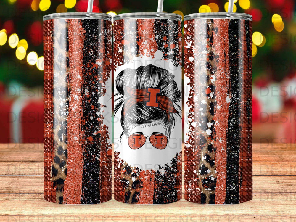 Tumbler with distressed orange and black plaid, leopard print, and glitter.