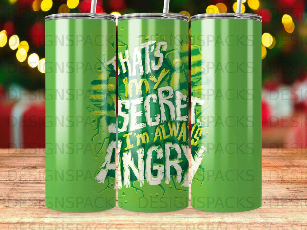 Green tumbler with "THAT'S MY SECRET I'M ALWAYS ANGRY" text.