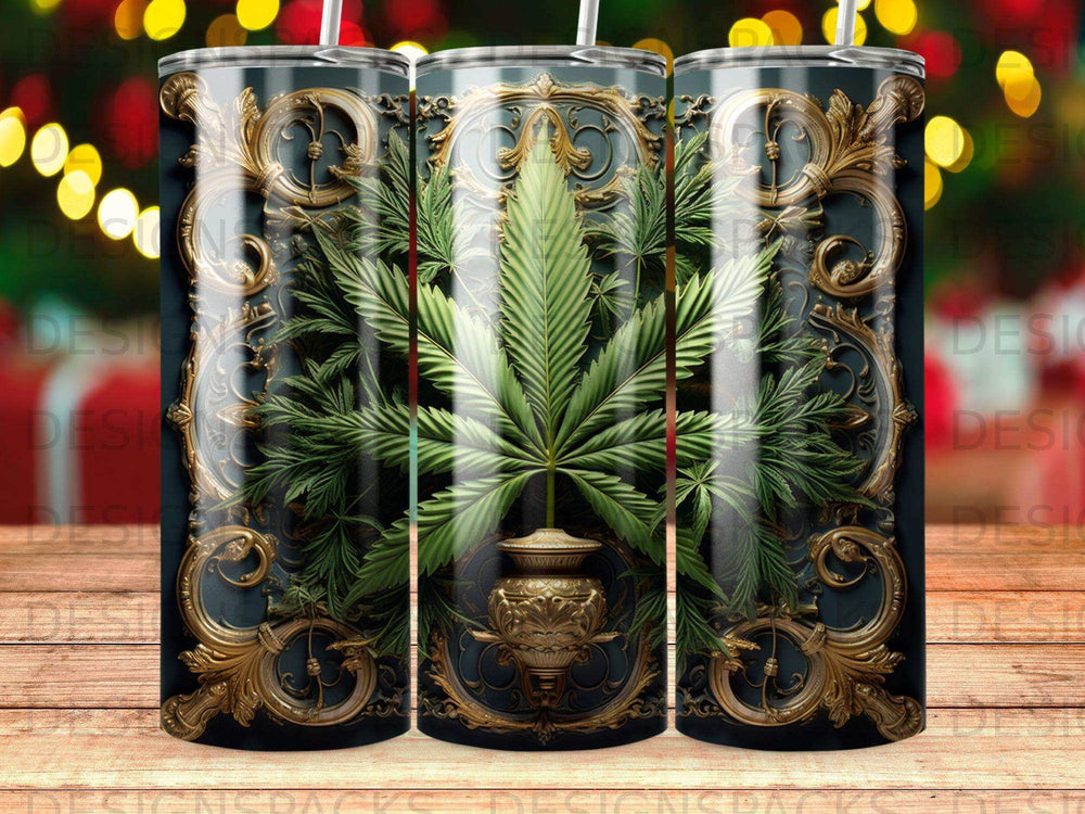 Tumbler with ornate gold cannabis leaf design on dark background.