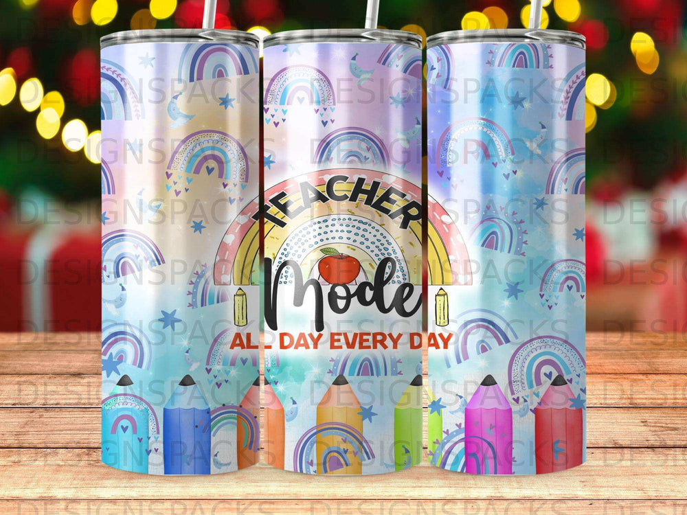 Teacher Mode All Day Every Day tumbler with rainbow and pencil design.