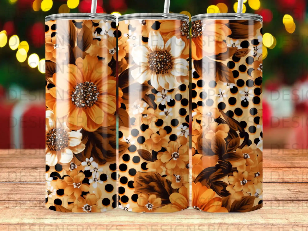 Tumbler with a floral pattern of sunflowers and dark spots on a beige background.