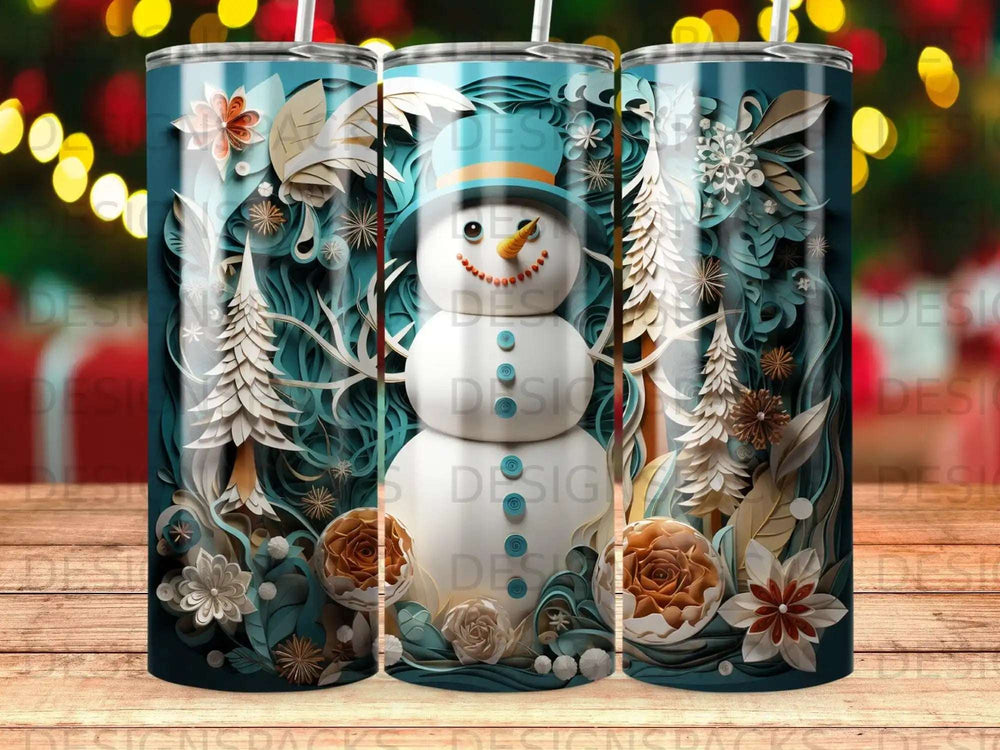 Snowman with floral and woodland design on a blue tumbler.