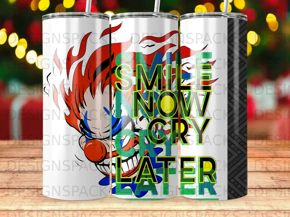 Tumbler with "Smile Now Cry Later" clown design.