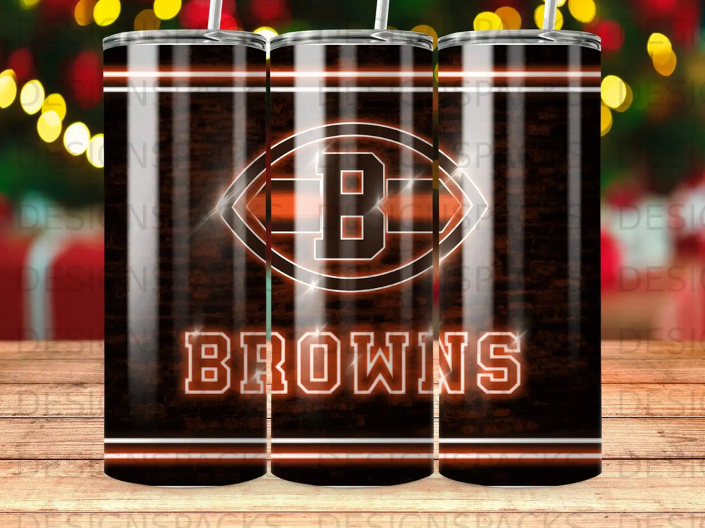 Cleveland Browns logo and text on a black and orange striped tumbler.