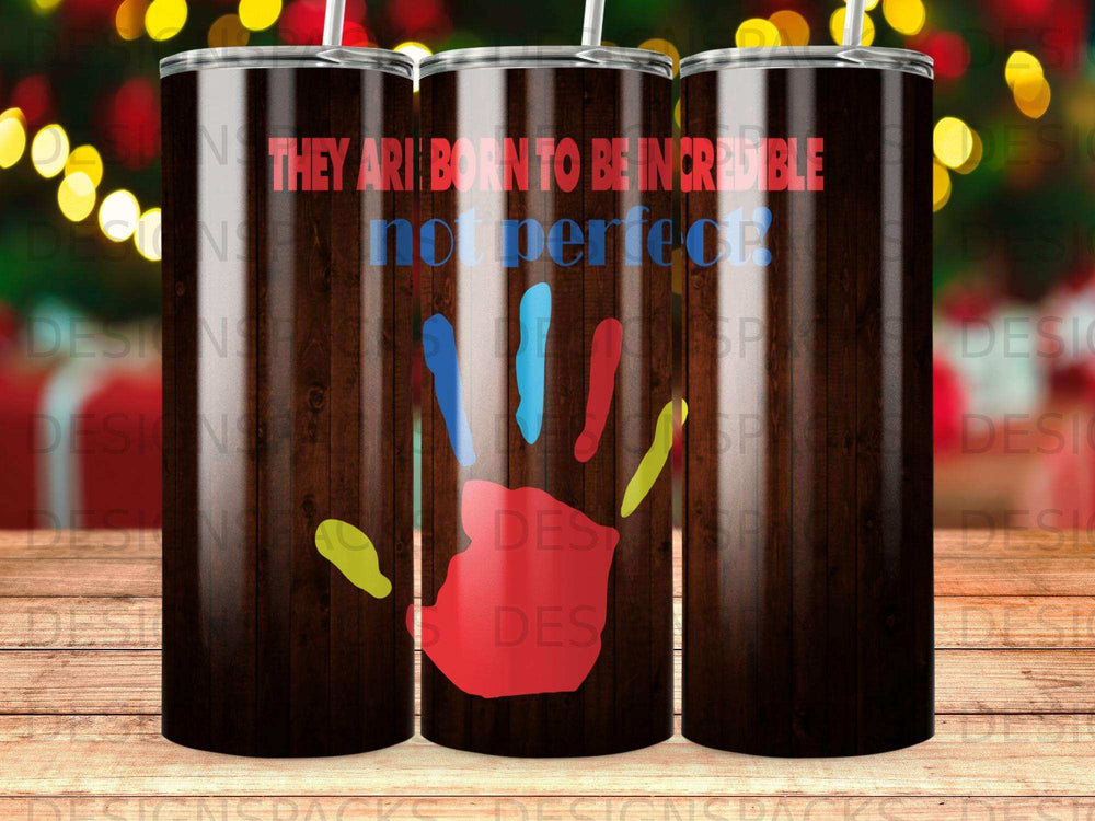 Tumbler with colorful handprint and "They are born to be incredible, not perfect" text.