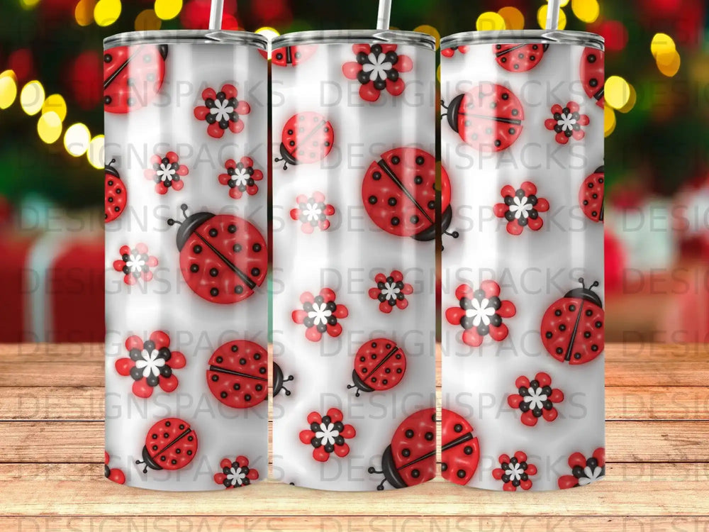 Three tumblers with ladybugs and flowers pattern.
