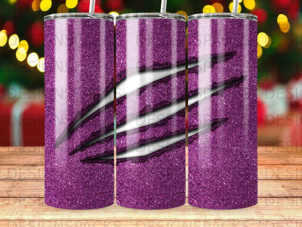 Purple glitter tumbler with ripped paper and claw marks design.