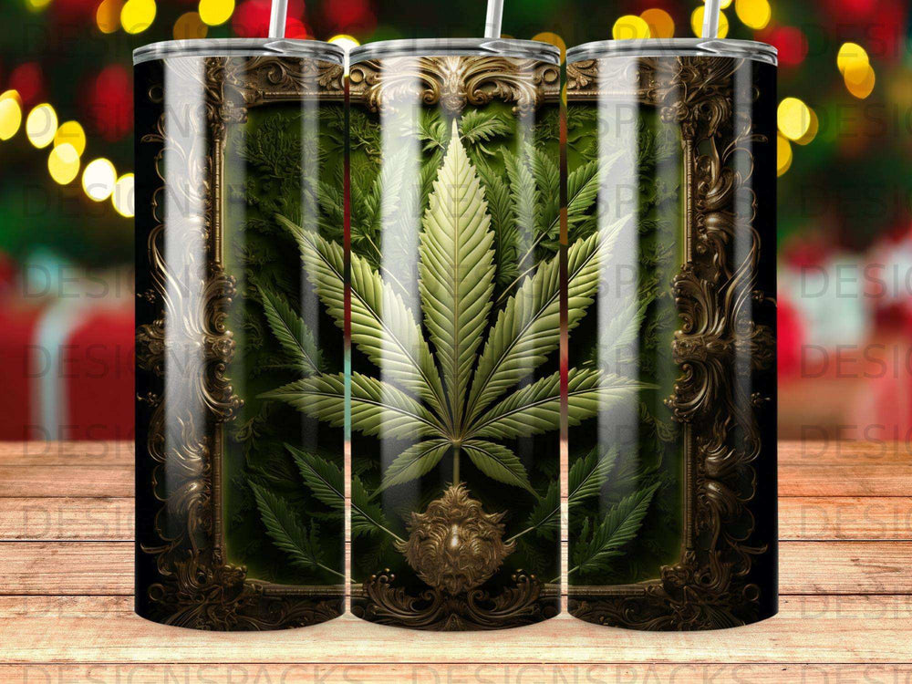 Tumbler with a green cannabis leaf in a decorative gold frame.