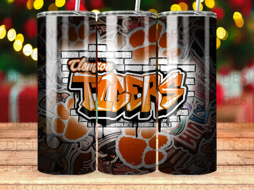 Clemson Tigers logo with paw prints on a brick background.