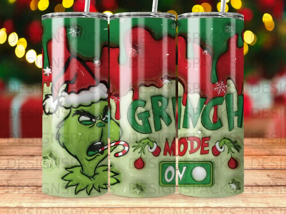 The Grinch in "Grinch Mode" on a green tumbler with red and white stripes.