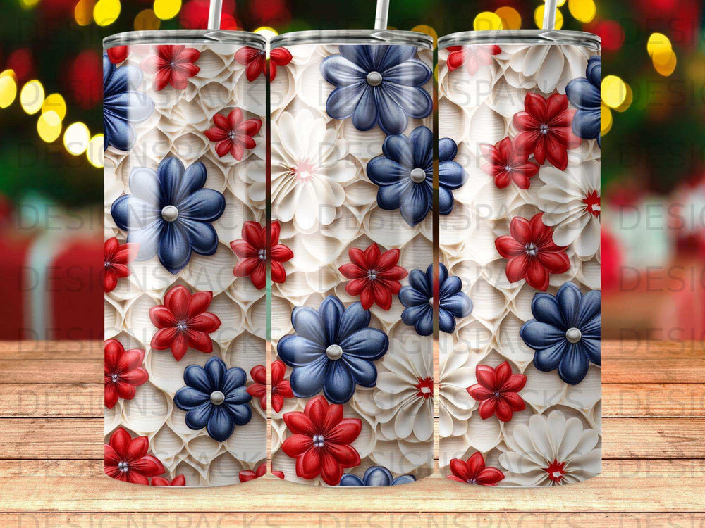 Three tumblers with a white floral pattern, red and blue flowers, and gold sparkle accents.