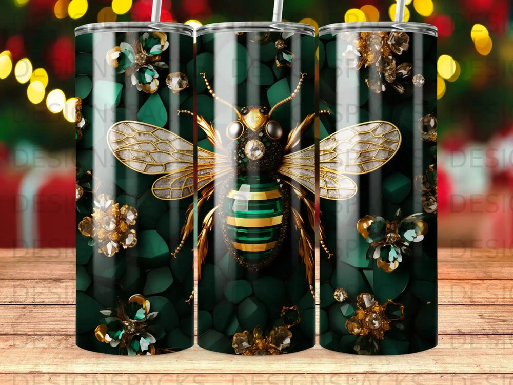 Bee and floral design on a green tumbler, gold accents.