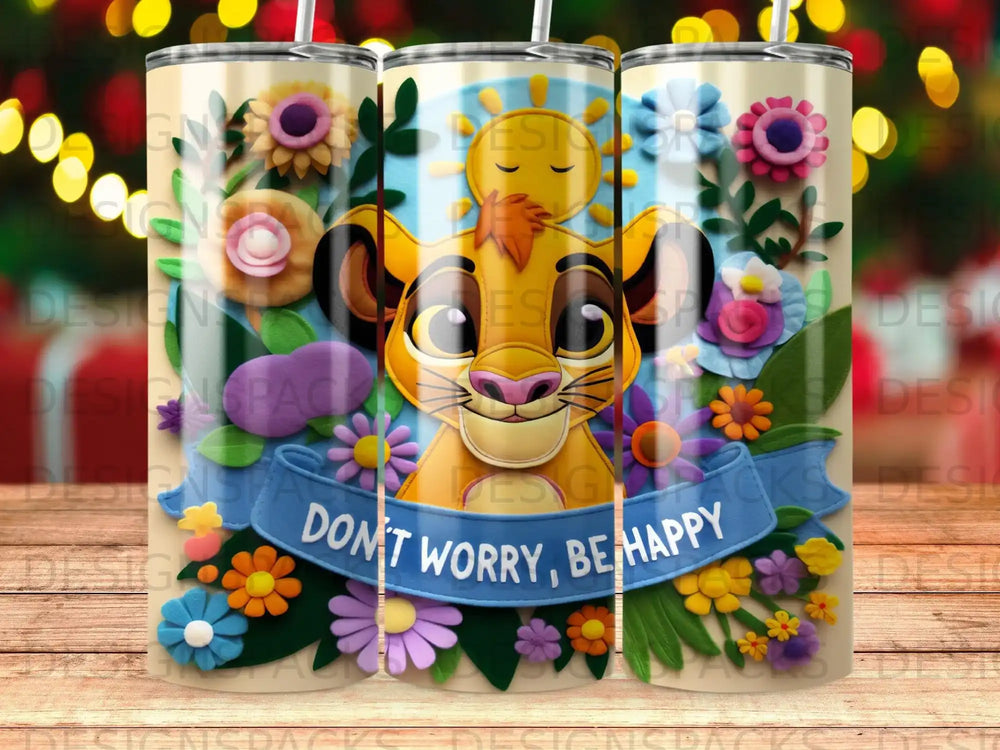 Simba with flowers and sun, text "Don't Worry, Be Happy" on a tumbler.