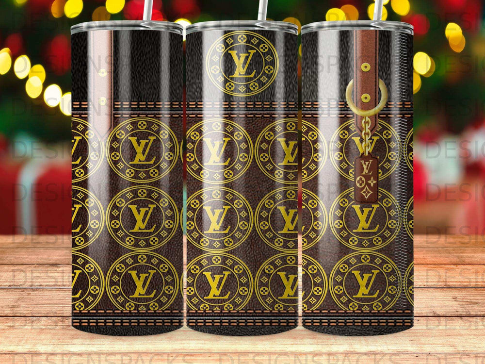 Brown tumbler with Louis Vuitton-inspired pattern and gold accents.