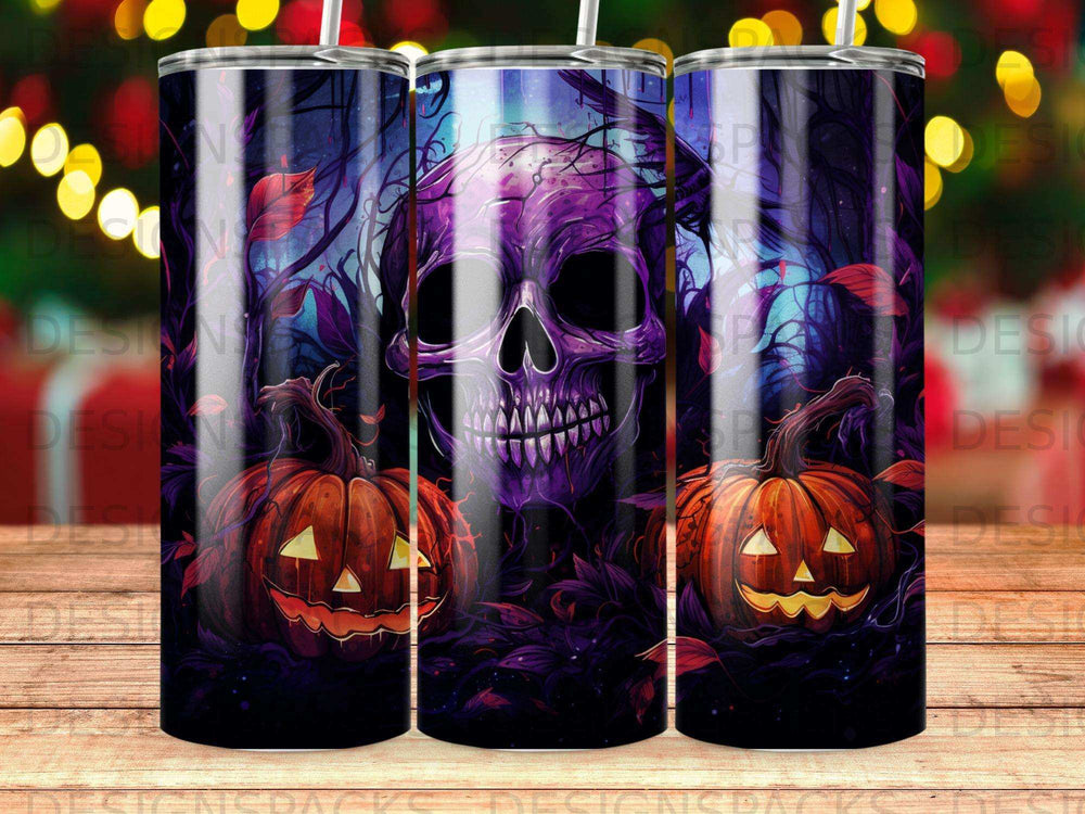 Spooky skull and pumpkins on a dark, purple and orange Halloween-themed tumbler.