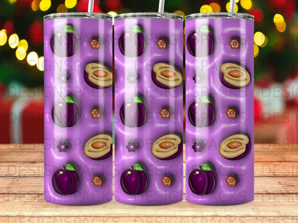 Purple plums and sliced fruit pattern on a tumbler.