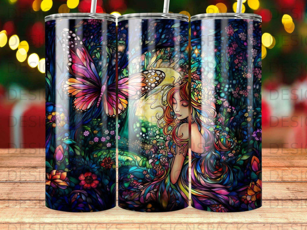 Stained glass tumbler with butterfly, woman, and vibrant floral forest scene.