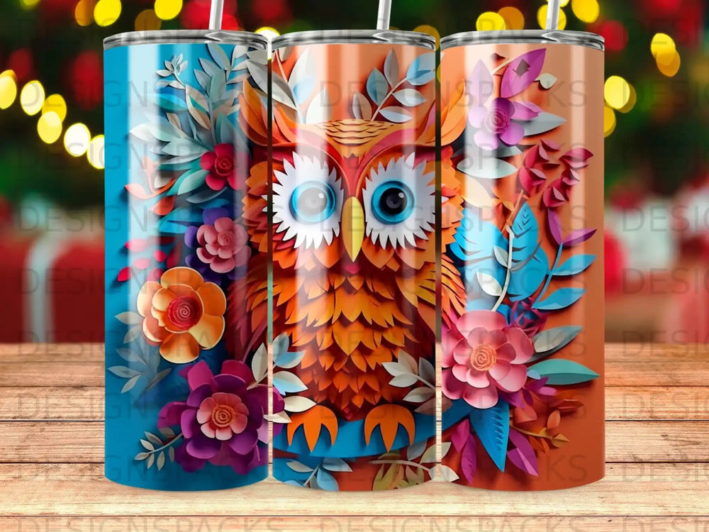 Three tumblers with colorful owl and floral designs.