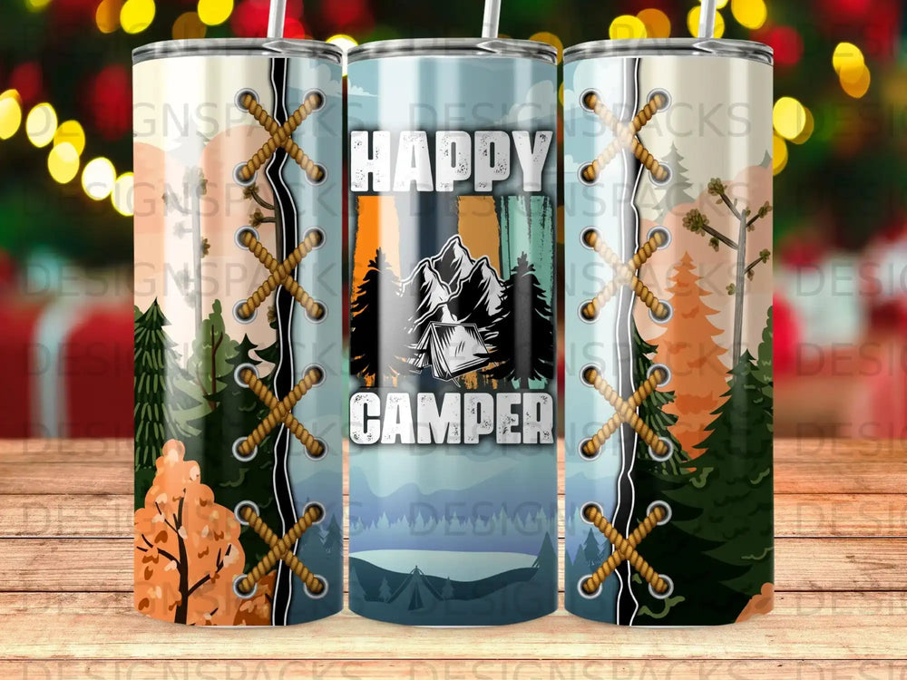 Tumbler with "Happy Camper" design and mountain landscape.
