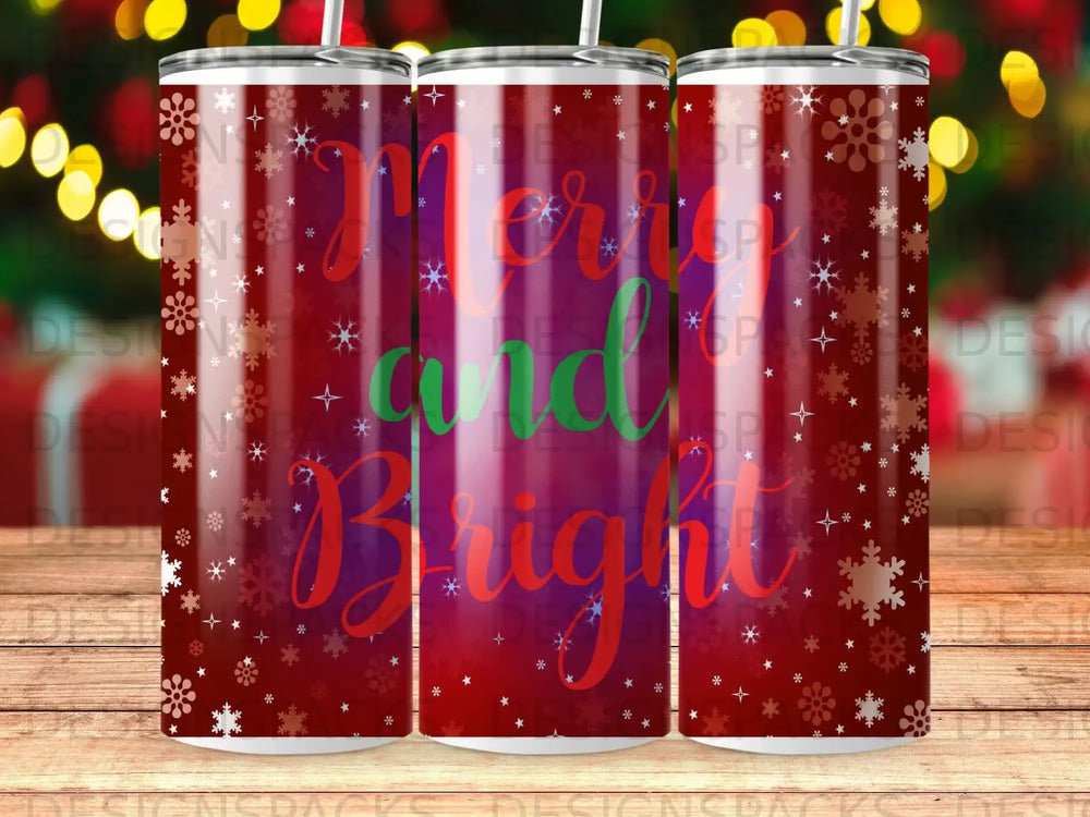 Tumbler with "Merry and Bright" text and snowflakes on a dark background.