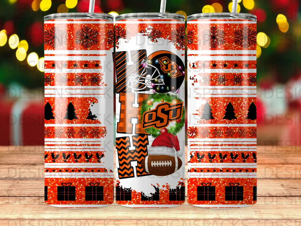 Cowboy Christmas tumbler with orange and black snowflake pattern and "HO HO HO" text.