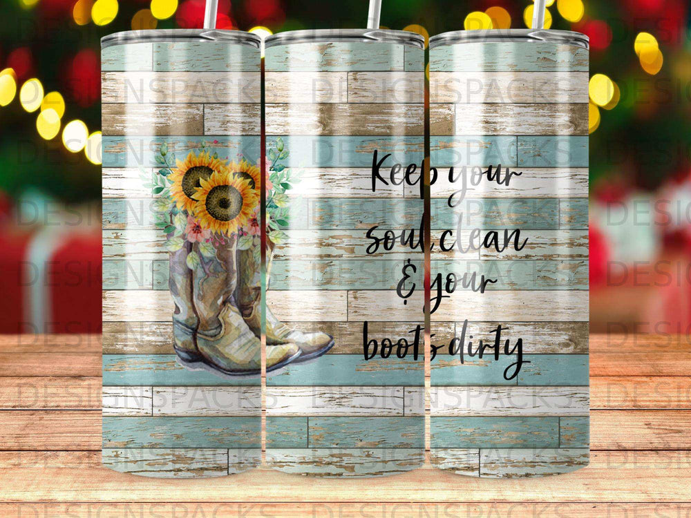 Cowboy boots with sunflowers on rustic wood background, "Keep your soul clean & your boots dirty".
