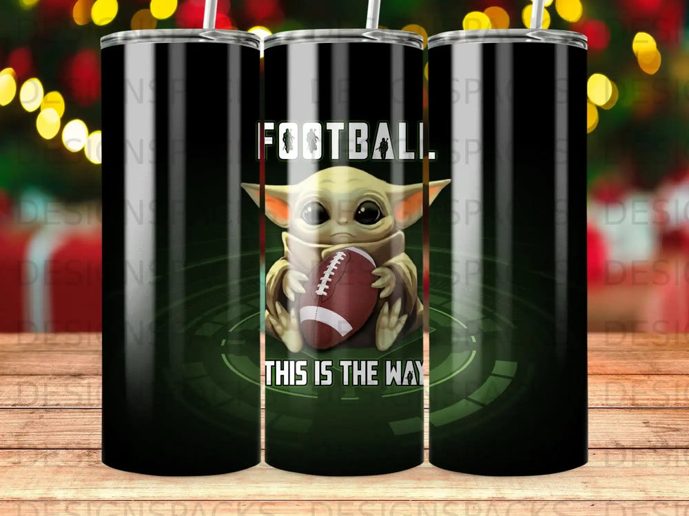 Grogu from Star Wars holding a football, "This is the way".
