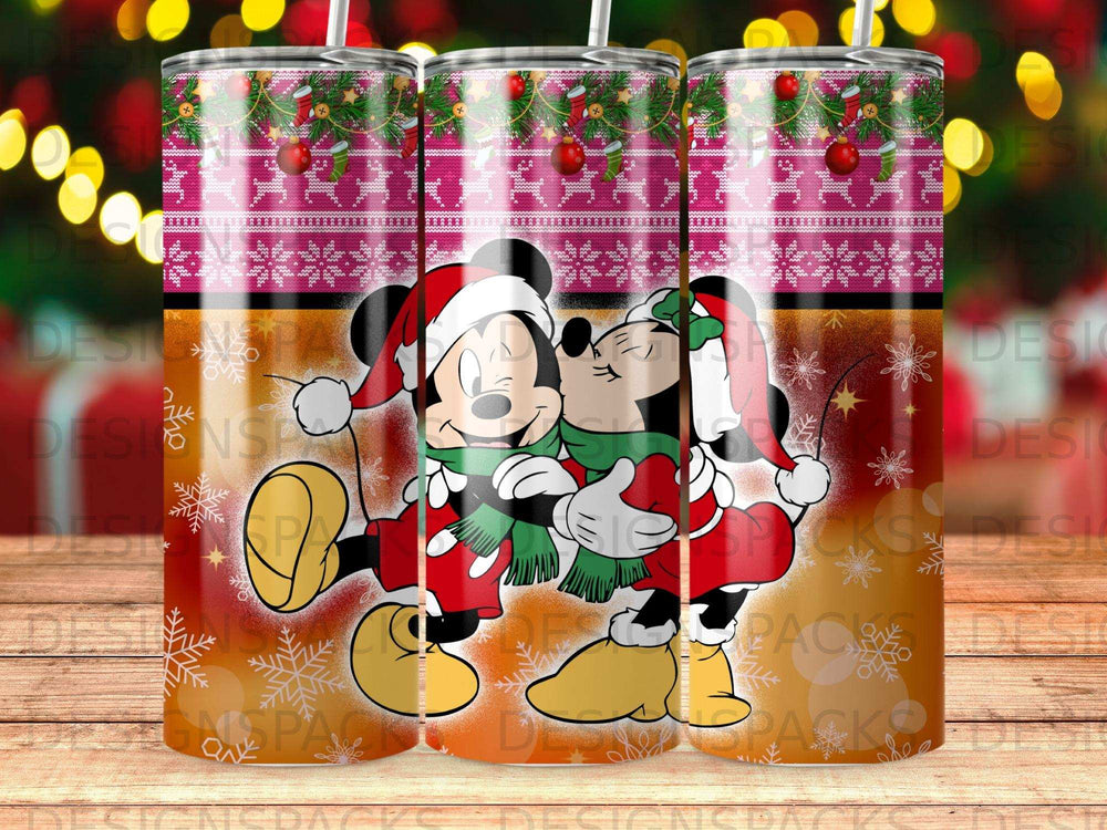 Mickey and Minnie Mouse in Christmas sweaters, kissing, on a snowflake-patterned tumbler.