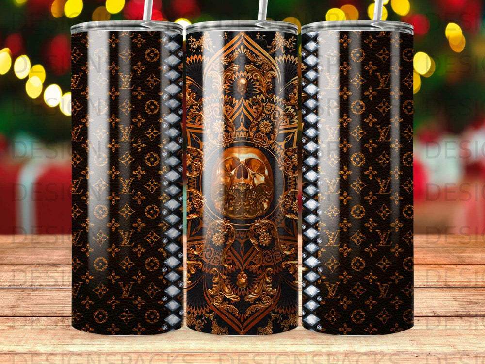 Skull and ornate gold pattern on black tumbler with repeated monogram.