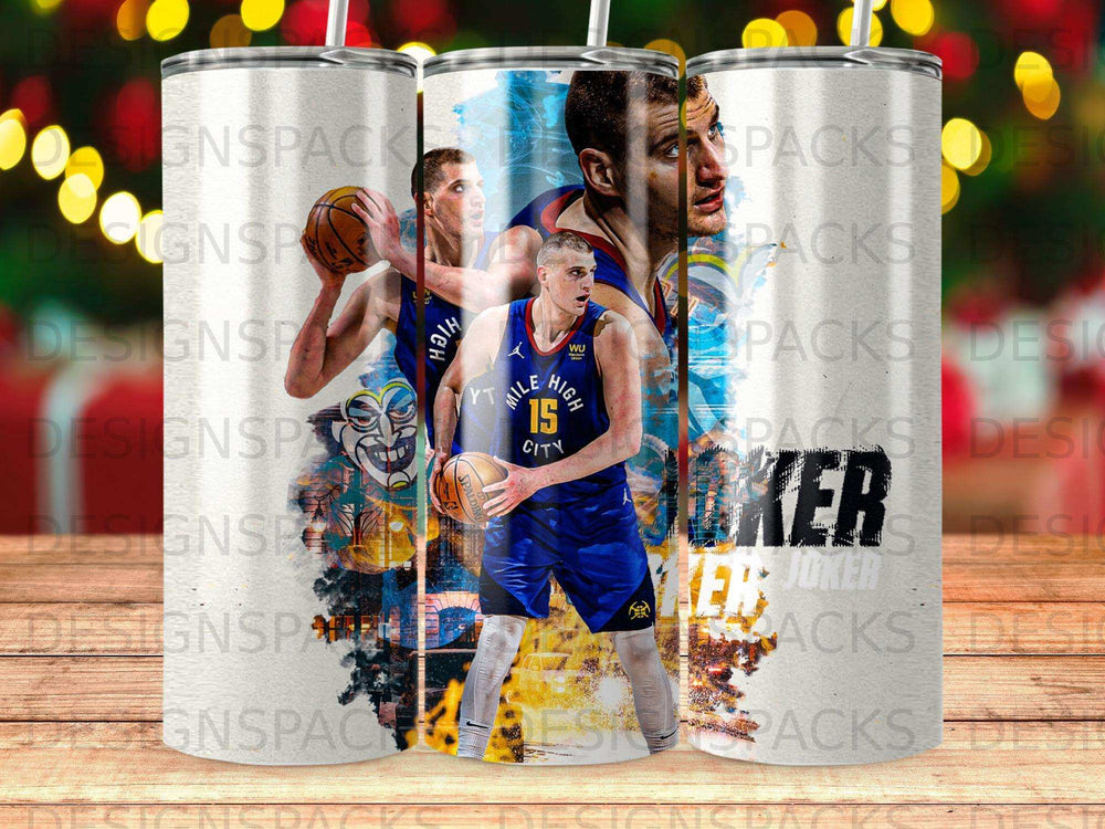 Nikola Jokic of the Denver Nuggets dribbling a basketball.