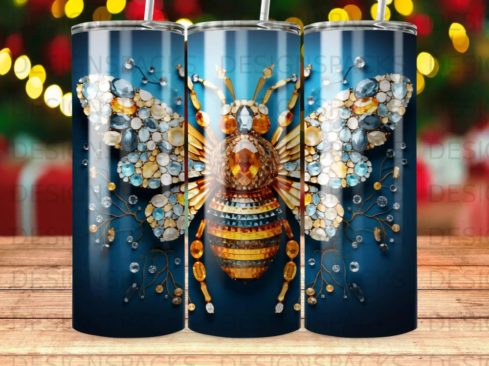 Bee design with jeweled wings on a blue gradient tumbler.