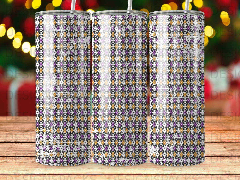 Tumbler with a distressed argyle pattern in purple, orange, and gold.