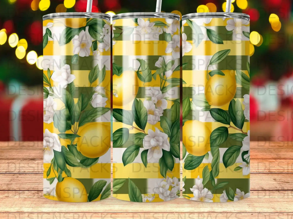 Yellow and green striped tumbler with lemons and white flowers.