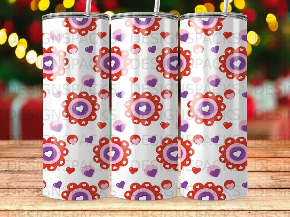 White tumbler with repeating pattern of purple and red hearts and flowers.