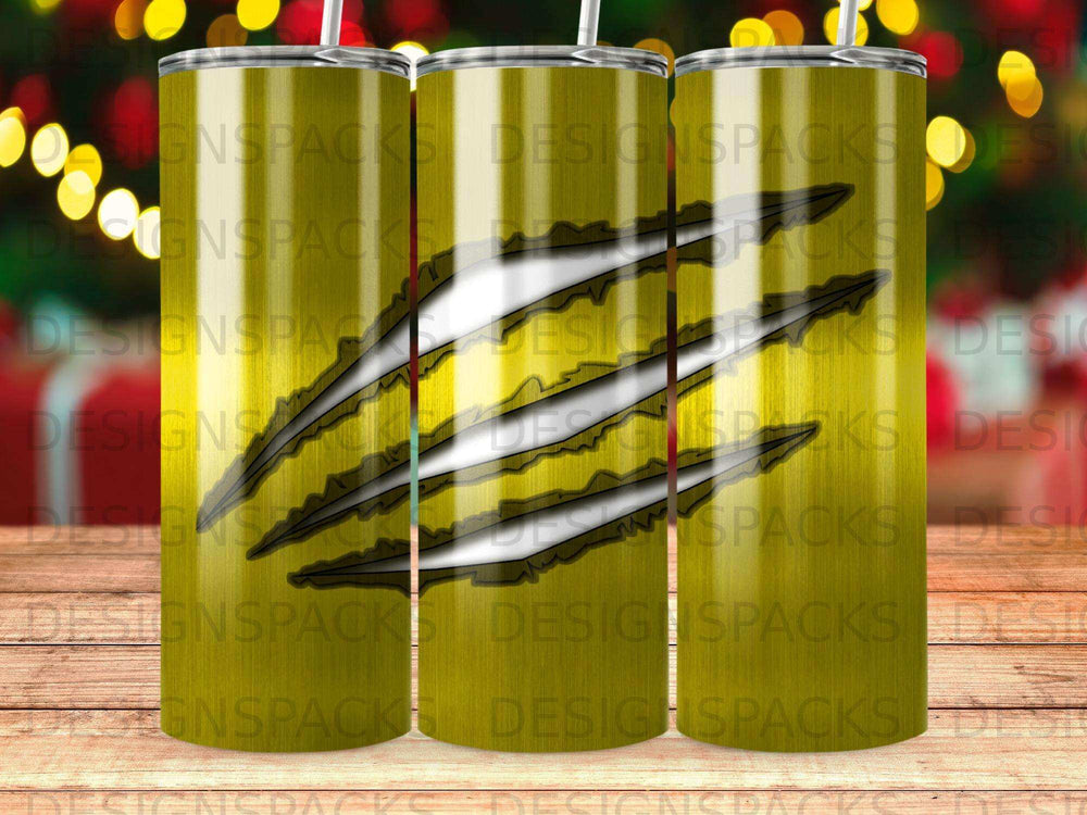 Gold tumbler with claw marks and "DESIGNSPACKS" repeating pattern.