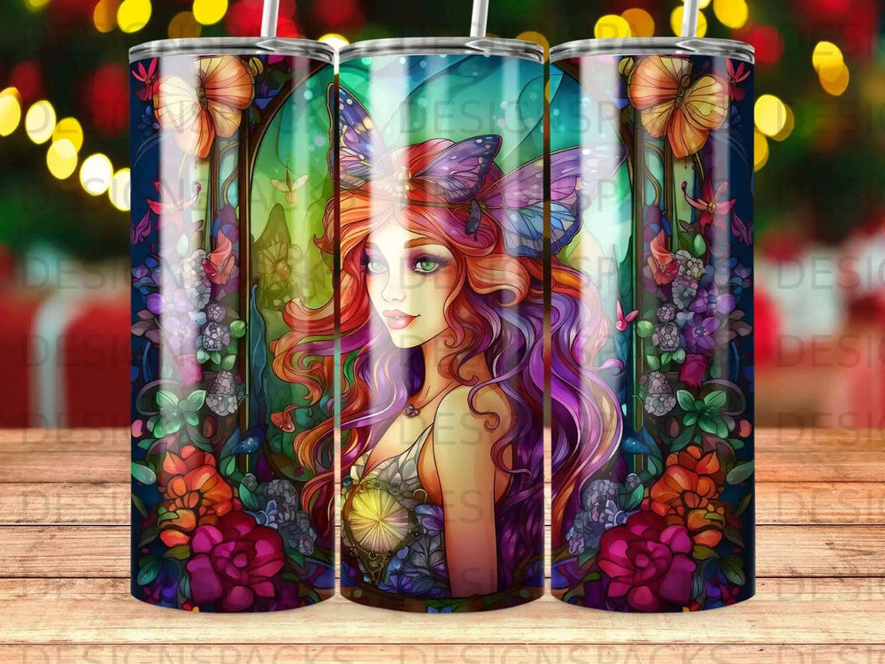 Fairy woman with butterfly wings and vibrant floral artwork on a tumbler.