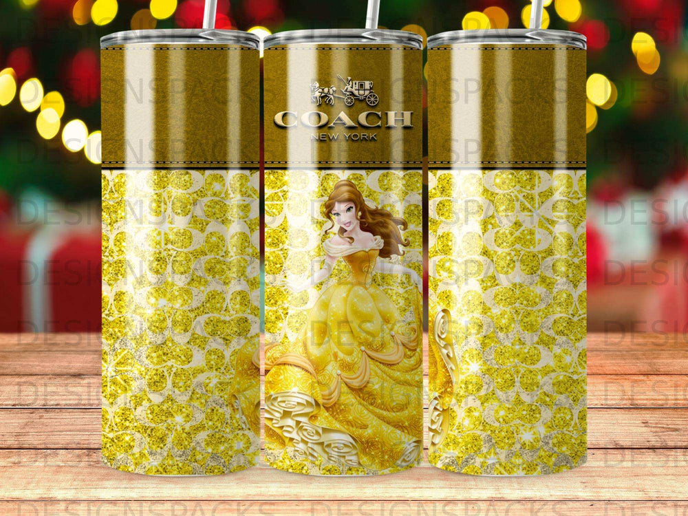 Coach New York Belle tumbler with gold glitter and floral pattern.