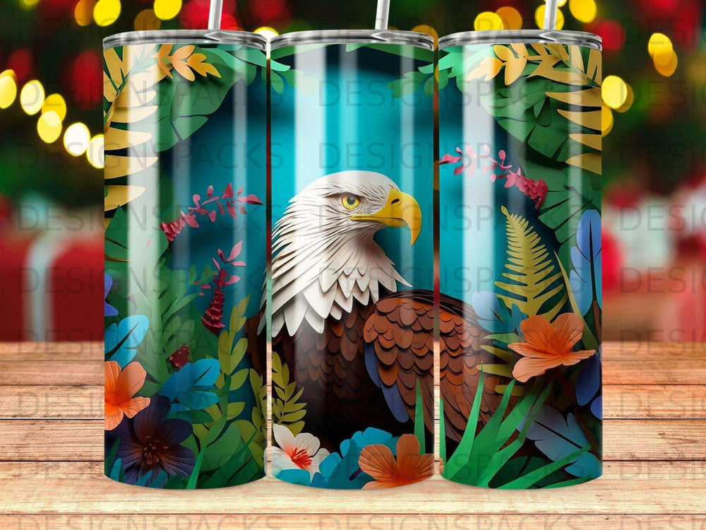 Eagle with colorful tropical foliage and flowers on a cylindrical tumbler.