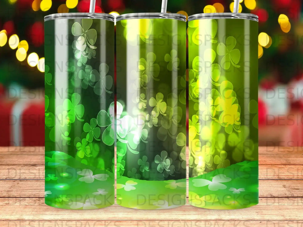 Three green tumblers with a shamrock pattern, some text visible.